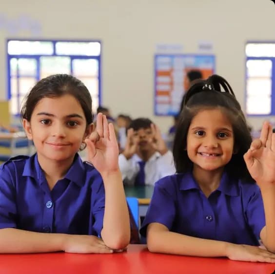 School Girls Raising Hands